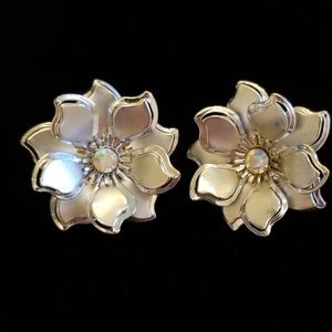 Silver colored flower clip ons